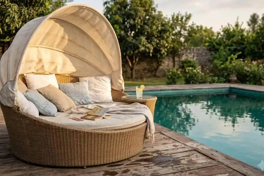Outdoor Daybed With Canopy: The Buying Guide Others Skip 1 Outdoor daybed with canopy set beside a pool on a sunlit patio
